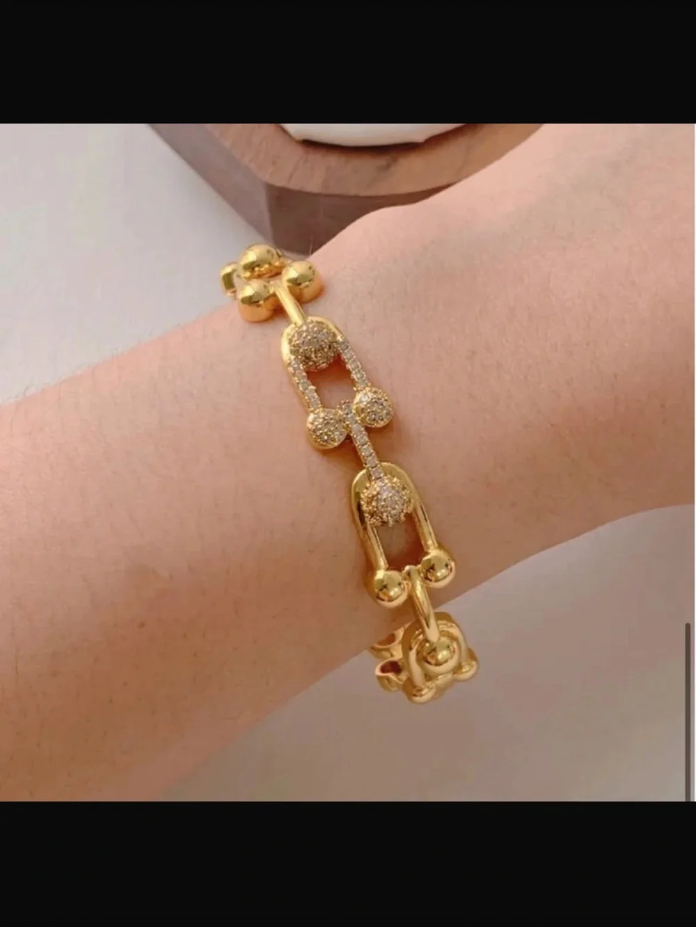 Goldtone bracelet.
